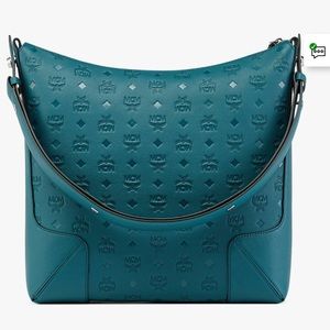 Mcm aren hobo in monogram leather. Brand new never used.